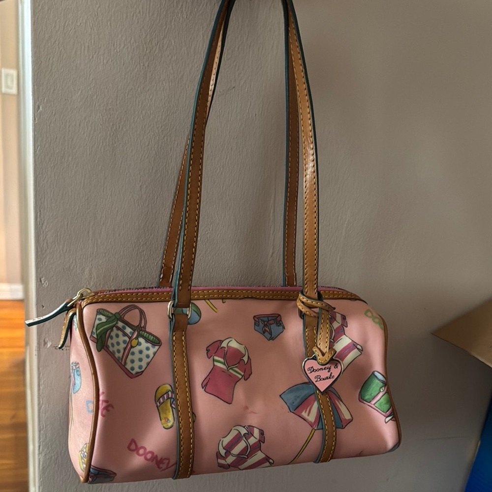 Dooney & Bourke Pink Shoulder Bag with Playful Design